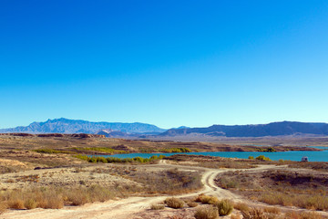 Poster - Dirt roads provide access to Overton Arm of Lake Mead National Recreation Area in Nevada