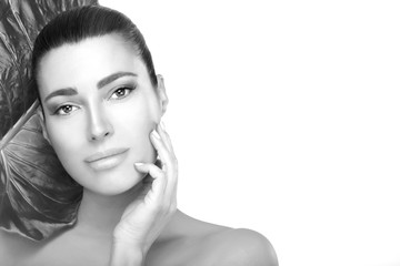 Wall Mural - monochrome beauty face woman with clean fresh skin touching her face