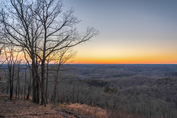 dramatic sunset sky over the hill. view from vista point in morrow mountain state park.