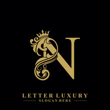 Initial Letter N Luxury Beauty Flourishes Ornament With Crown Logo Template.