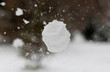 © OB production - Snowball flies into the camera. The snowball shatters into snowflakes
