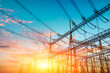 © ABCDstock - High voltage electricity tower at sunset.substation industrial background.