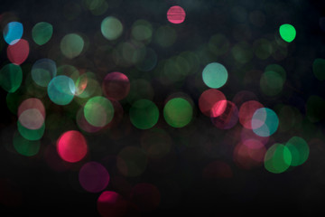 Wall Mural - colorful bokeh like shining star on black background