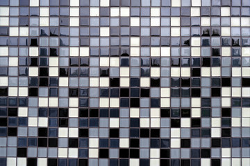 Mosaic Background of Black, White And Gray Ceramic Tiles.