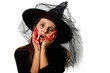 Czarownica z rękami w krwi. Halloween.