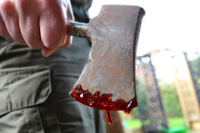 Hand Axe Dripping With Blood