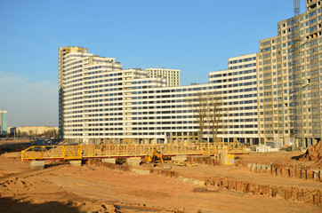 Poster - Excavator for digging a pit for the construction of an underground tunnel of the metro line. Installation of a gantry crane. Subway construction project, Minsk, Belarus, Aerodromnya street