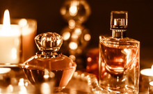 Perfume Bottle And Vintage Fragrance On Glamour Vanity Table At Night, Pearls Jewellery And Eau De Parfum As Holiday Gift, Luxury Beauty Brand Present