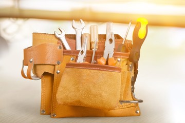 Sticker - Tool belt with tools  on  background