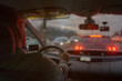 © Monika Wisniewska - Driving a car in the city at night in traffic jams