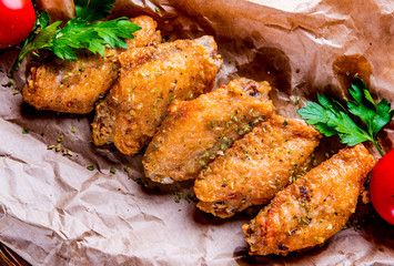 Wall Mural - Fried Chicken Wings on wooden table background