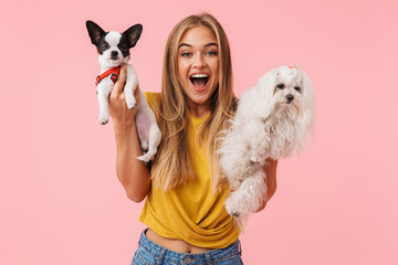 Cute lovely girl playing with her pet chihuahua