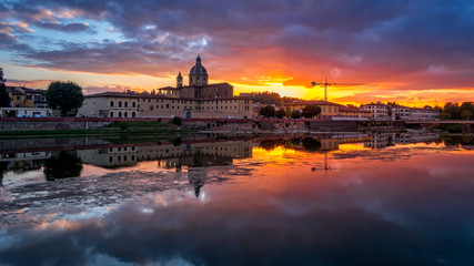 Wall Mural - FLORENCE, TUSCANY/ITALY - OCTOBER 19 : View of buildings along the River Arno at dusk  in Florence  on October 19, 2019