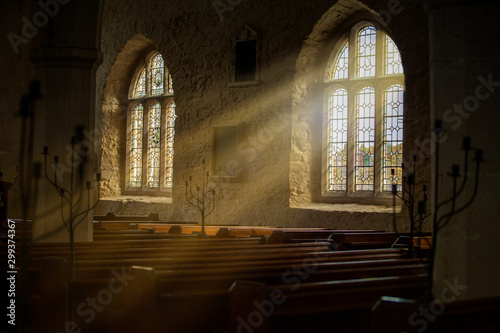 Fotografía Stained glass windows with sun rays pouring in