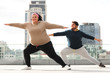 © New Africa - Overweight couple doing sport exercises together outdoors