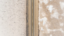Aerial View Of Road Crossing Salinas Grande, Touristic Attraction, Argentina.