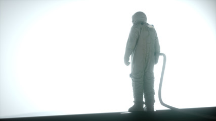 Wall Mural - alone astronaut in futuristic interior looking in the huge window. 3d rendering