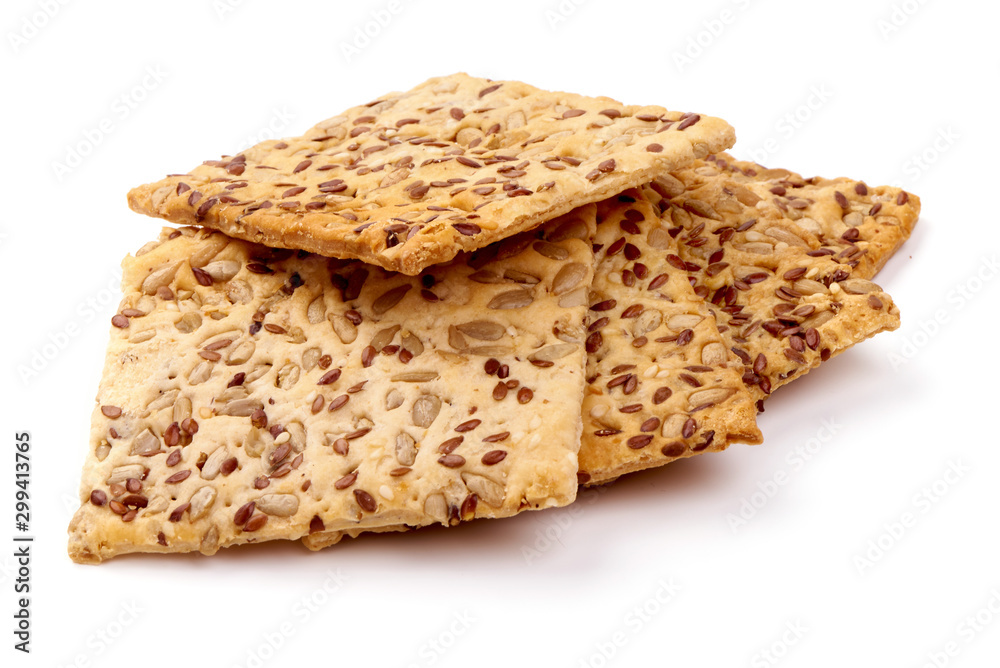 Crispy crackers with sesame and flax seeds, isolated on white background - obrazy, fototapety, plakaty 