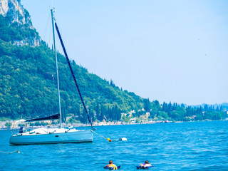 Canvas Print - Garda, Italy - July, 20, 2019:  Image of parked motor boats in Italy