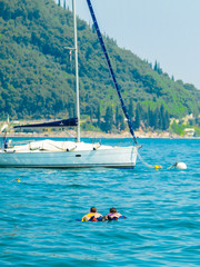 Canvas Print - Garda, Italy - July, 20, 2019:  Image of parked motor boats in Italy