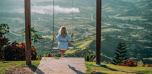 Beautiful View Of Young Woman Swing On The Top Of The Mountain Redonda In Dominican Republic. Concept Travel, Vacation