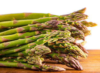 Asparagus on wood, close up