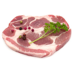 Wall Mural - Raw pork neck chop meat with parsley herb leaves and peppercorn spices garnish isolated on white background cutout