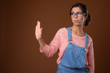 Wall Mural - Portrait of beautiful multi ethnic nerd woman with eyeglasses