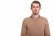 © Ranta Images - Portrait of young handsome bearded man looking at camera