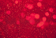 Abstract Defocused Circular Red Luxury Gold Glitter Bokeh Lights Background.