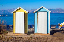Beautiful Yellow And Blue Public Toilet  At The Beach Near Sidari In Corfu, Greece