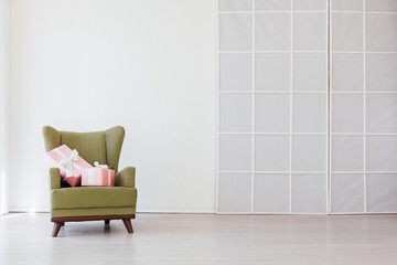 Canvas Print - green vintage chair in the interior of the white room of the house