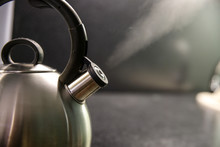 Kettle With Boiling Water. Whistle On A Boiling Kettle. A Jet Of Steam From The Boiling Kettle. Boiling Stainless Kettle Whistles