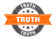 truth round stamp with orange ribbon. truth