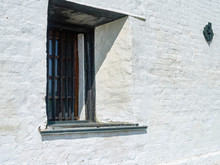 White Wall Of An Ancient Fortress With A Window