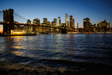 Fototapeta  - The Manhattan skyline at night - New York City, NY