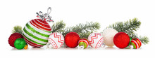 Christmas Border Of Red, Green And White Ornaments With Branches. Side View Isolated On A White Background.