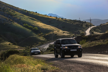 Canvas Print - Cars Driving on Mountain Road