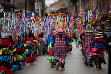 LOEI, THAILAND - September 24, 2017 :Ghost Festival (Phi Ta Khon) People are enjoying the costumes with colorful clothes made of wood. Painting on the mask is a local wisdom of Thailand.