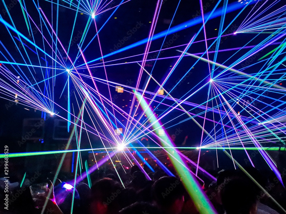 Colourful laser in a nightclub - obrazy, fototapety, plakaty 