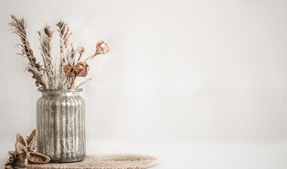 Still life beautiful vase with dried flowers .