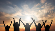 A Group Of People Raised Their Hands Freely And Freely. With Abstract Sunset Conceptual Background