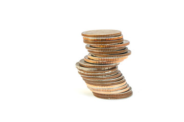 Close up stack or pile old silver coins isolated on white background.