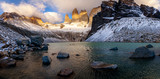 Fototapeta  - Sunrise over the three Peaks forming the Torres del paine, Patagonia, Chile