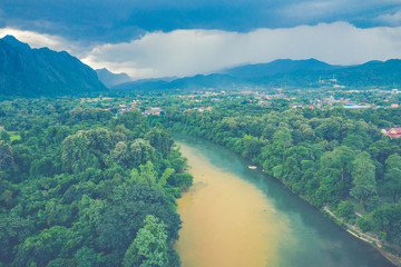 Wall Mural - Aerial view of beautiful landscapes at Vang Vieng , Laos. Southeast Asia. Photo made by drone from above. Bird eye view.