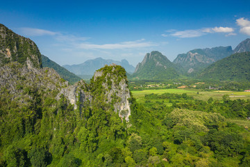 Wall Mural - Aerial view of beautiful landscapes at Vang Vieng , Laos. Southeast Asia. Photo made by drone from above. Bird eye view.