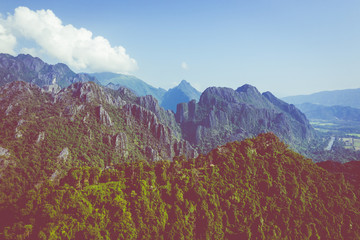 Wall Mural - Aerial view of beautiful landscapes at Vang Vieng , Laos. Southeast Asia. Photo made by drone from above. Bird eye view.