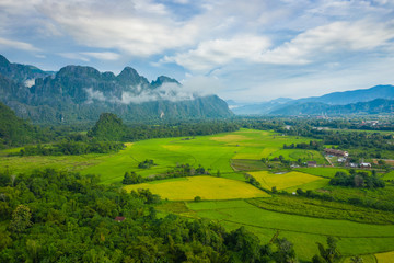 Wall Mural - Aerial view of beautiful landscapes at Vang Vieng , Laos. Southeast Asia. Photo made by drone from above. Bird eye view.