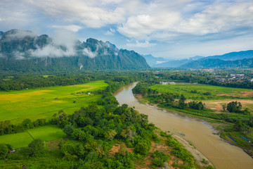 Wall Mural - Aerial view of beautiful landscapes at Vang Vieng , Laos. Southeast Asia. Photo made by drone from above. Bird eye view.