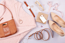Flat Lay Of Woman Clothing And Accessories In Pastel Colors